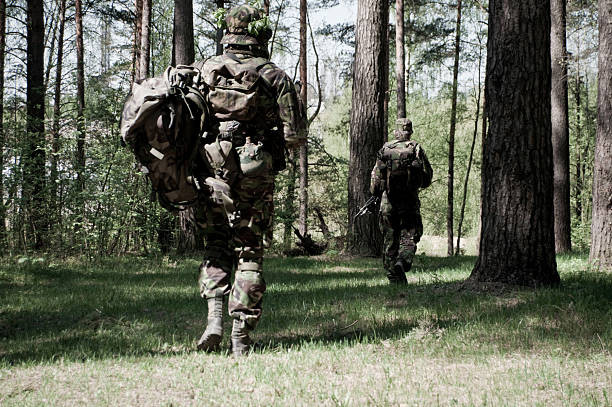 soldiers-in-a-forest-picture-id157567204.jpg.558add05e22e7912ee54158dc7220879.jpg